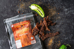 Showcase of our Turkey Run Brisket Beef Jerky Ghost Pepper with seasonings
