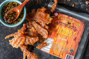 A photo showcasing our Teriyaki flavored Turkey Jerky with seasonings