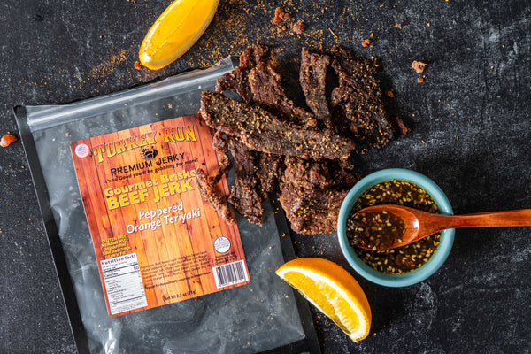 A photo of Brisket Beef Jerky with bursting flavors of Peppered Orange Teriyaki